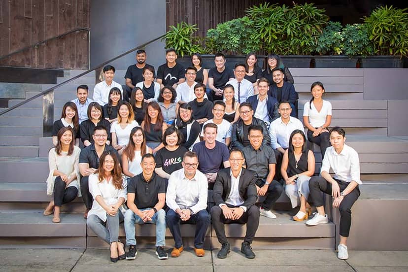 Corporate team headshots photographed on-location in Singapore office setting